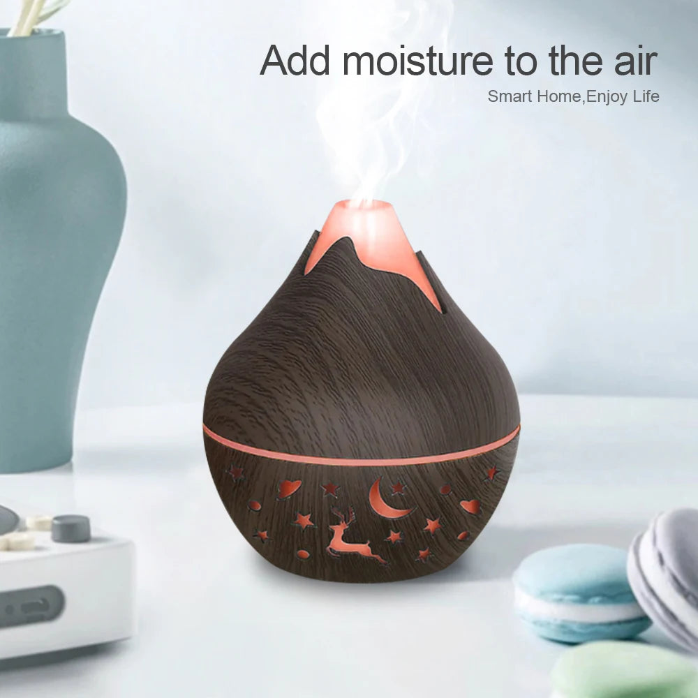 200ML USB Air Humidifier Diffuser Wood grain aroma diffuser with 7 color lights with 2 oils.